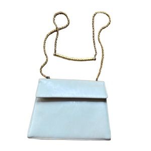 Luxury brand vintage Rodo creme leather and goldtone chain crossbody/clutch.